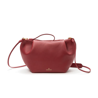 Leather Raspberry clutch with shoulder strap, handmade in Spain. La Portegna